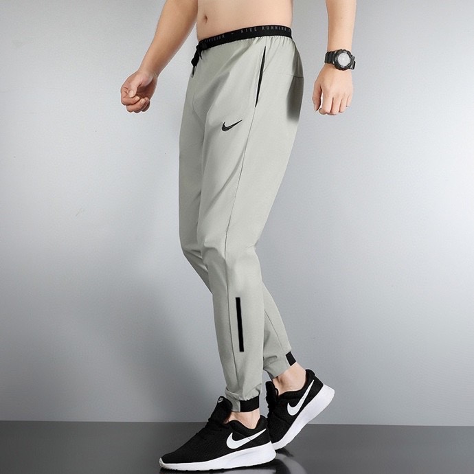 Pantalon Nike Bande - Gris
